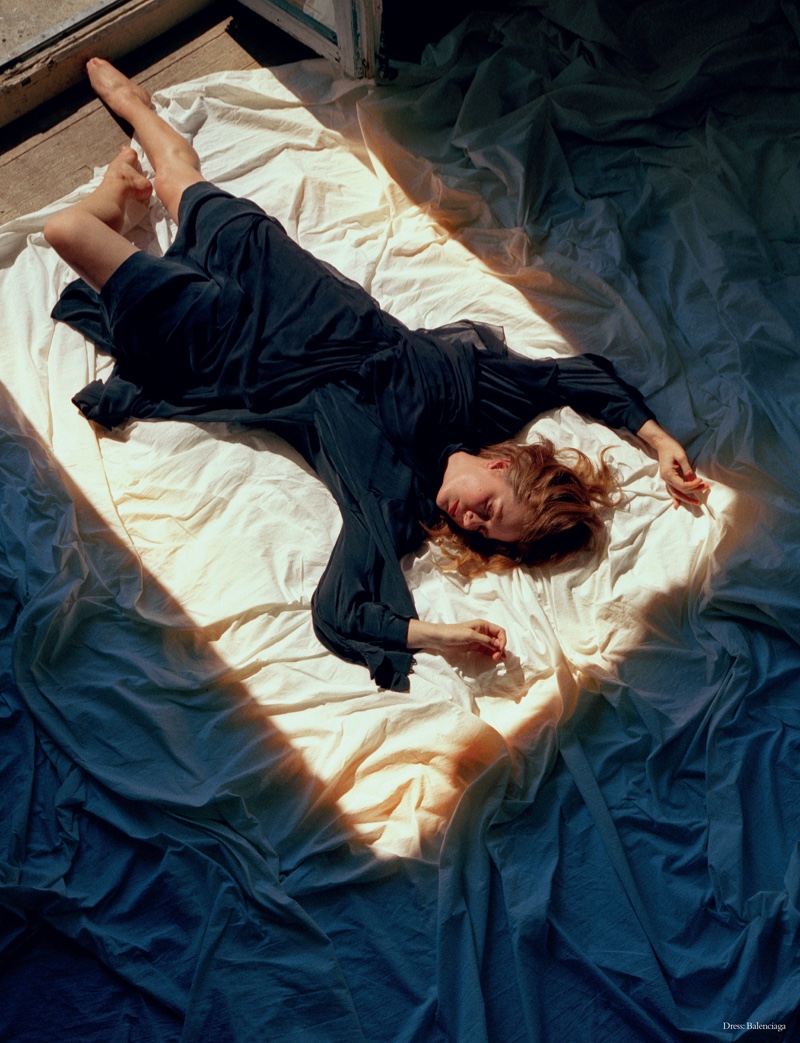 Laying on the ground, Amy Adams wears a Balenciaga dress