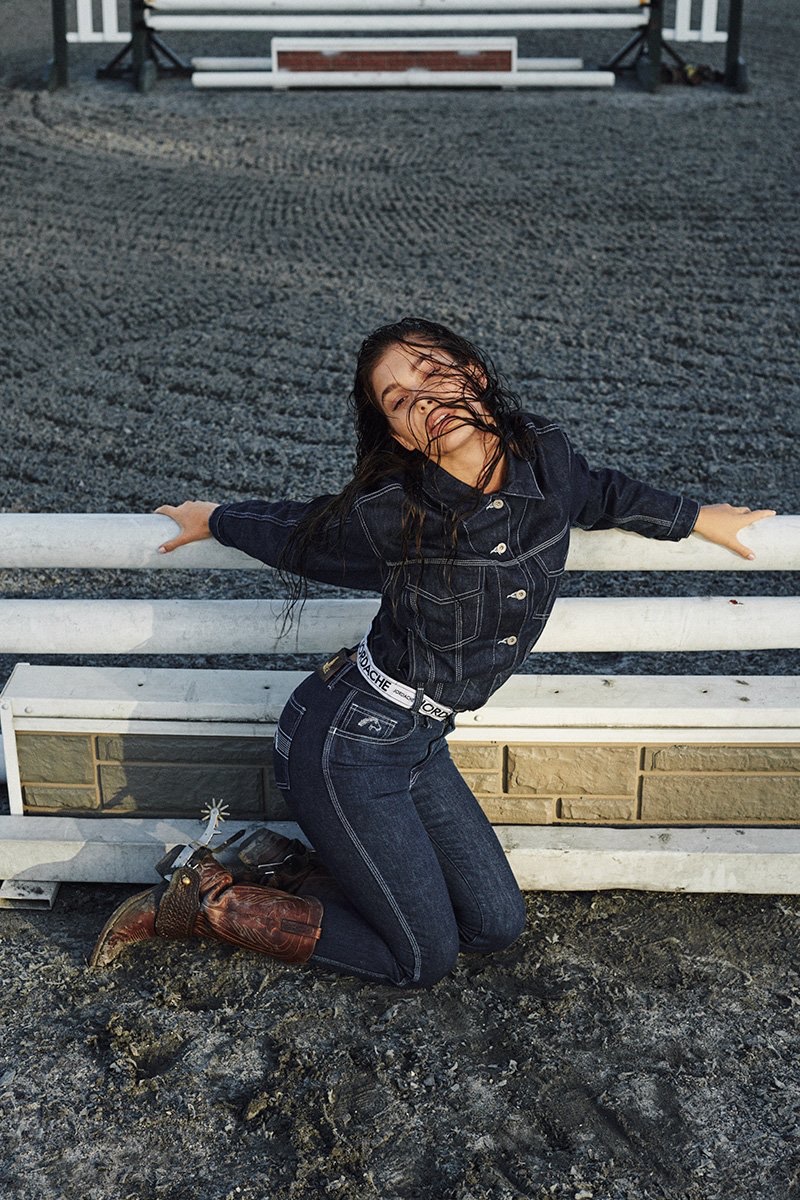 Posing at a farm, Camila Morrone wears Jordache's denim styles