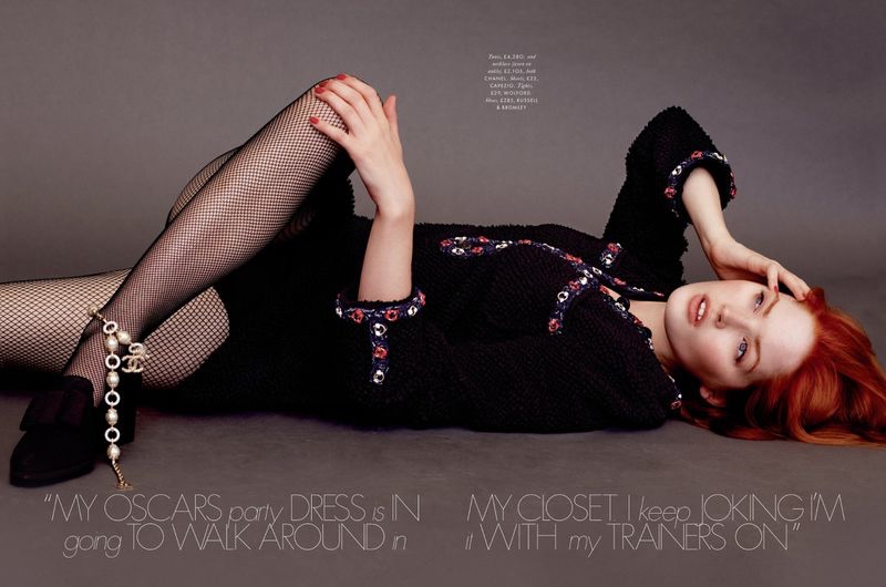 Ellie Bamber poses in Chanel tunic