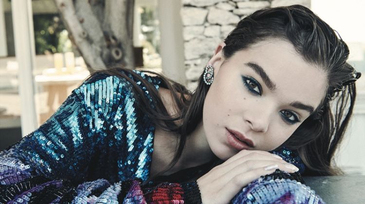 Posing in a Balmain sequin top, Hailee Steinfeld wears Pomellato earrings