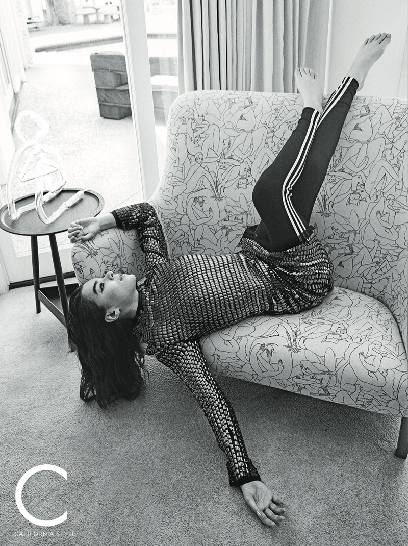 Hailee Steinfeld poses in Oscar de la Renta dress and adidas leggings