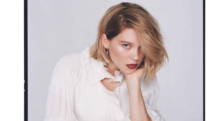 Dressed in white, Lea Seydoux wears Louis Vuitton dress