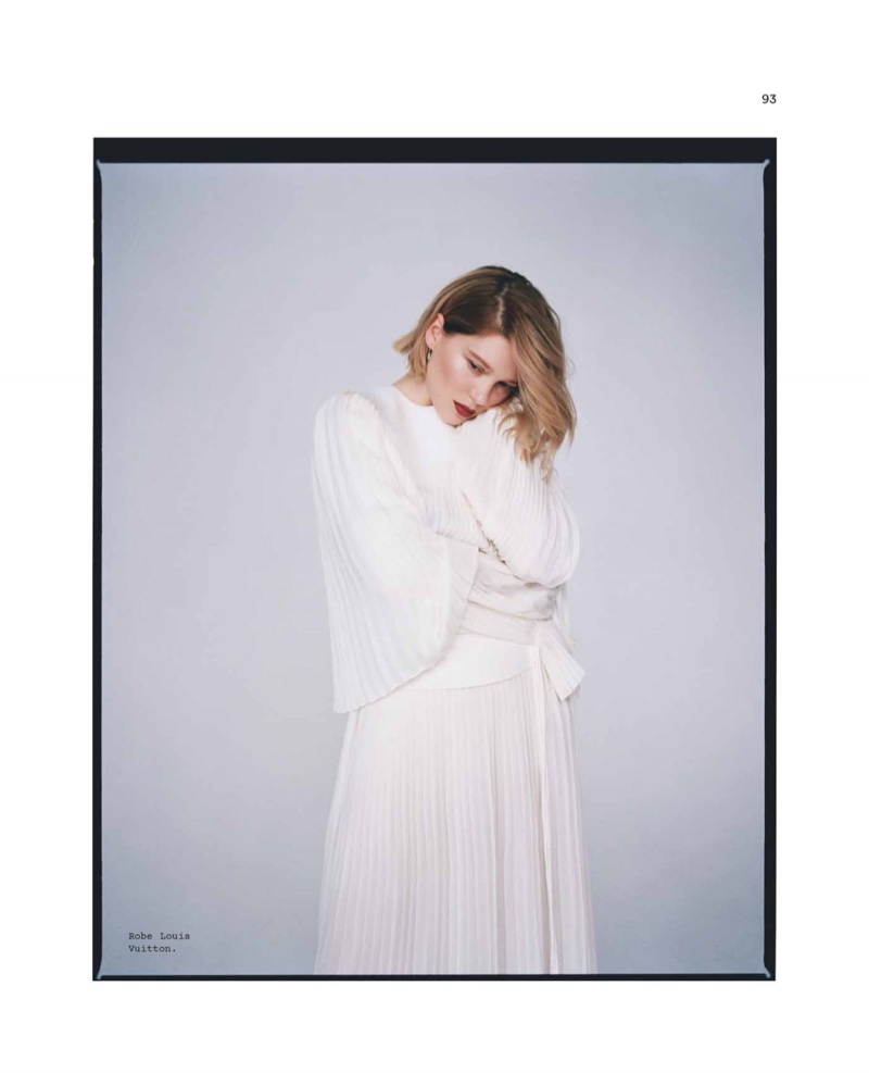 Embracing pleats, Lea Seydoux poses in Louis Vuitton dress