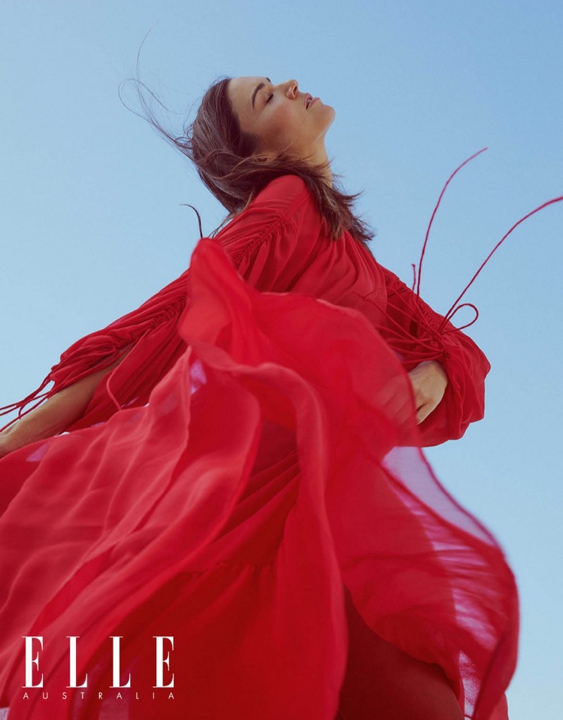 Dressed in red, Mandy Moore wears Camilla and Marc gown