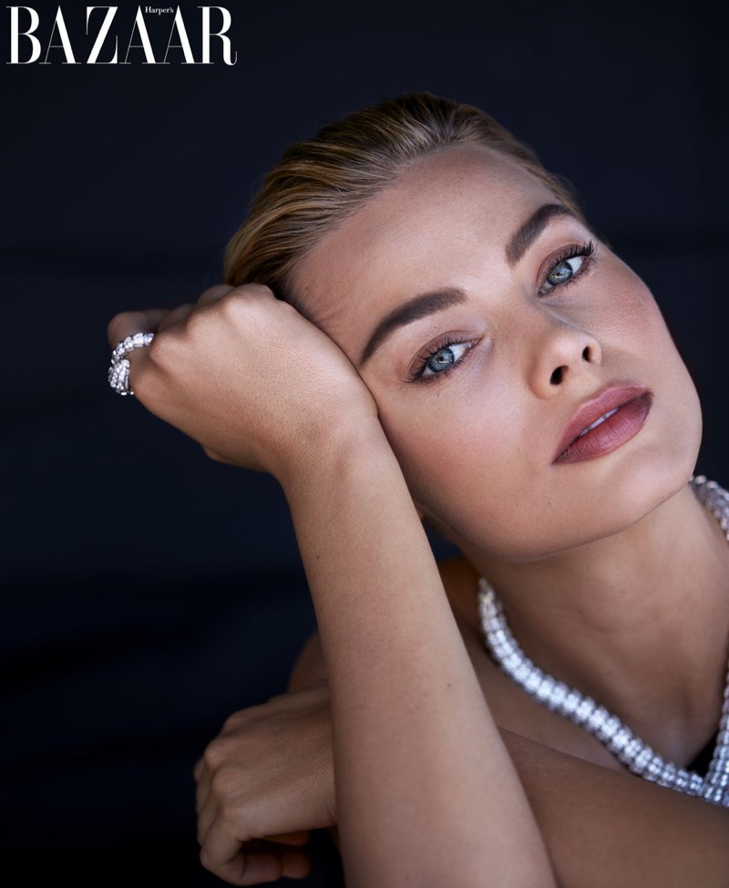 Turning up the shine factor, Margot Robbie wears necklace and ring