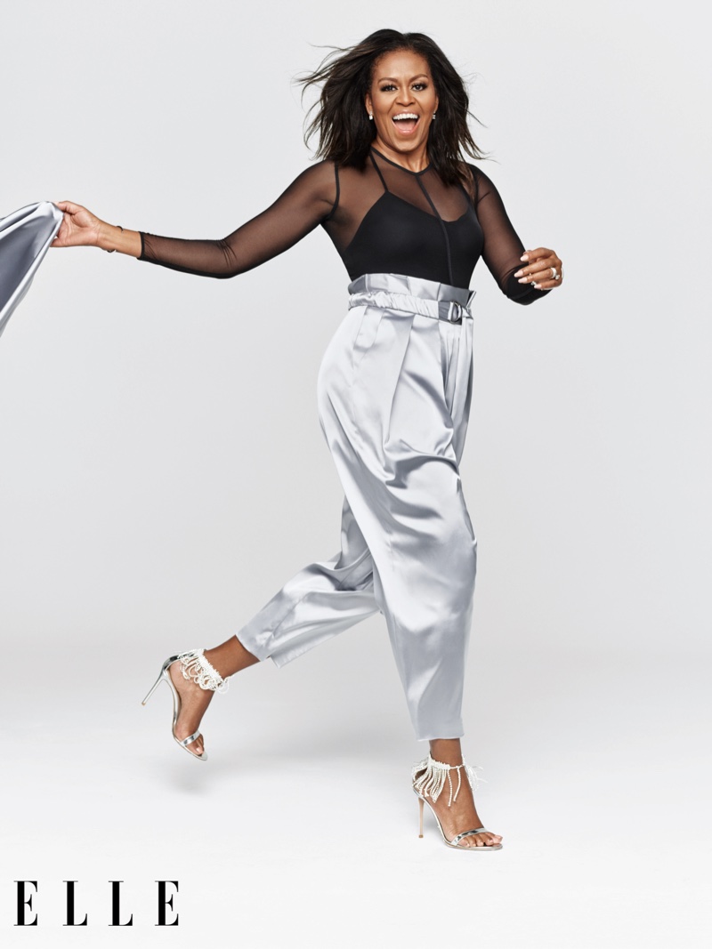 Former First Lady Michelle Obama poses in Sally LaPointe shirt and pants, Ann Demeulemeester bodysuit and Gianvito Rossi sandals