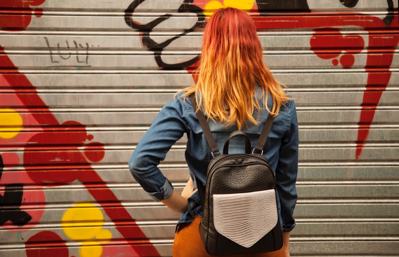 Girl with Red Hair and Backpack