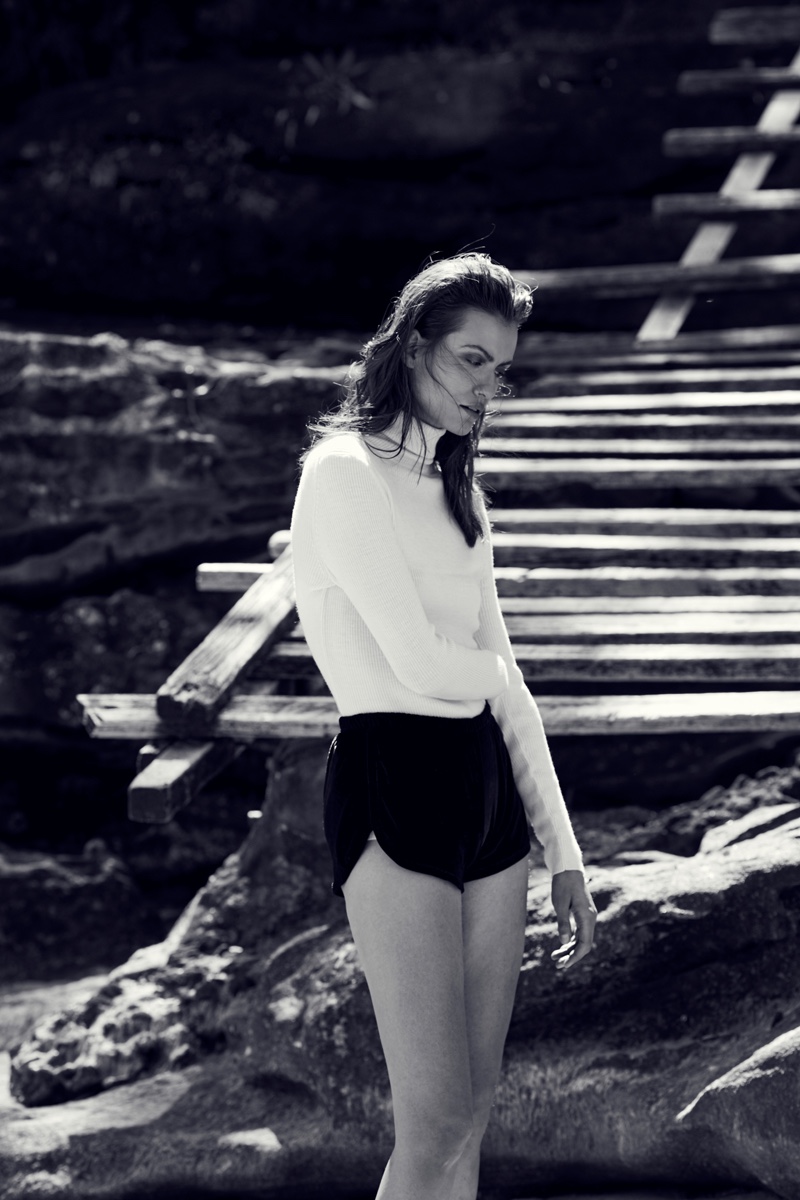 Uniqlo White Turtleneck Sweater and Brandy Melville Black Shorts. Photo: Milos Mlynarik