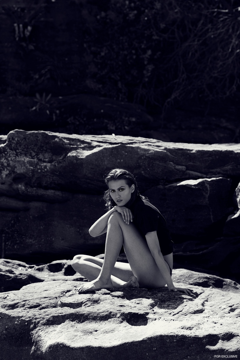 Vintage Black Top and Billabong Swimsuit Bottom. Photo: Milos Mlynarik