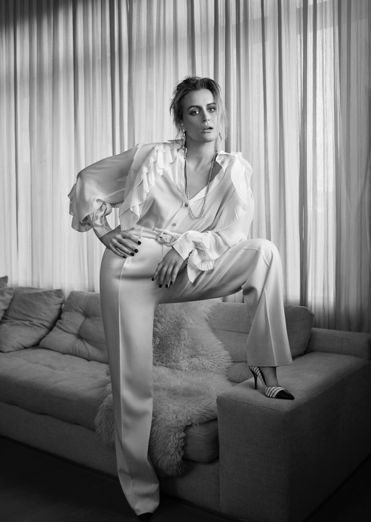 Striking a pose, Taylor Schilling wears Givenchy top and pants