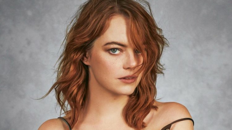 Emma Stone poses in a Louis Vuitton dress