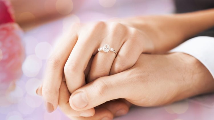 Engagement Ring Couple Wearing Hands