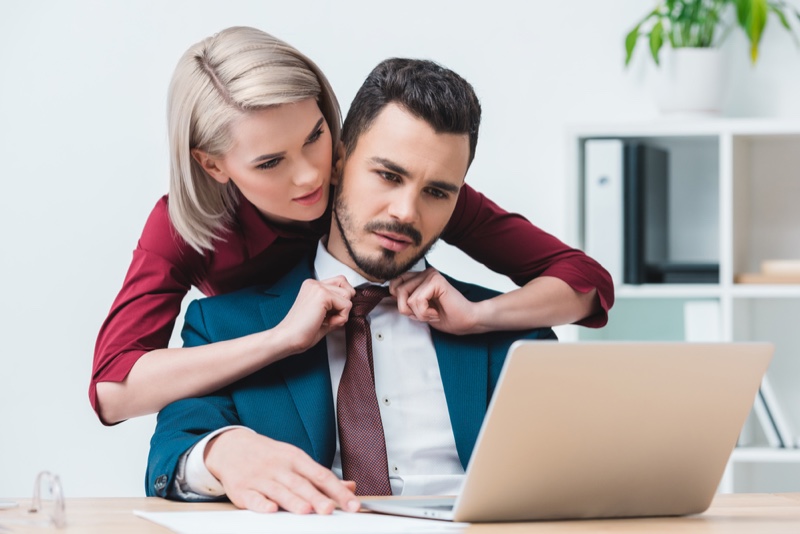 Woman Adjust Man's Tie