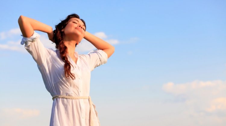 Woman Posing in Field and Happy