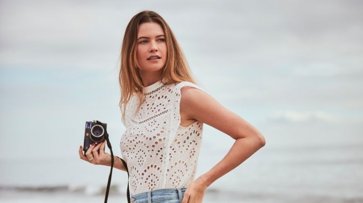 Behati Prinsloo poses on the beach in 7 For All Mankind spring-summer 2019 campaign