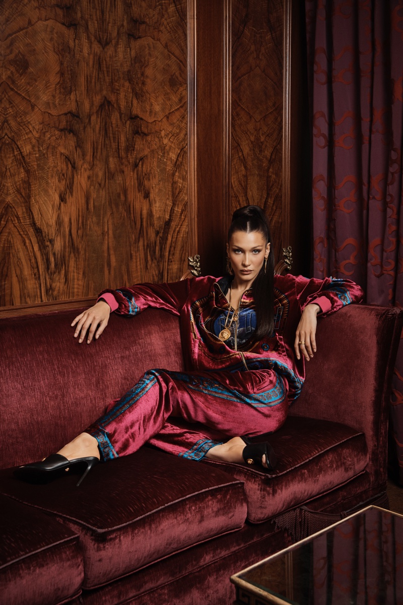 Bella Hadid wears burgundy tracksuit in Kith x Versace campaign