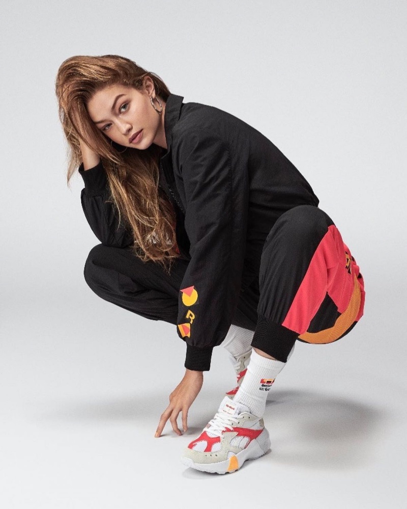 Striking a pose, Gigi Hadid wears her collaboration with Reebok