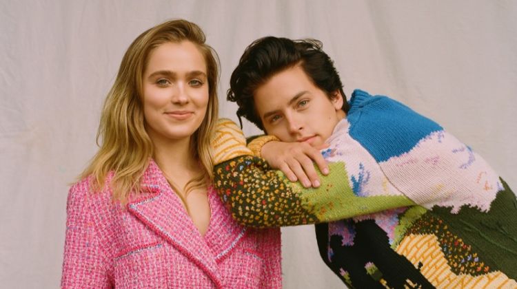 Haley Lu Richardson poses in pink jacket look while modeling alongside Cole Sprouse