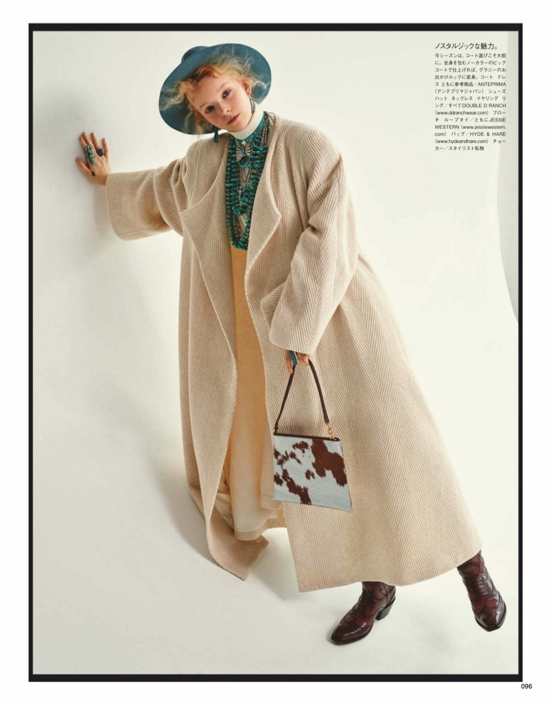 Lily Nova Poses in Oversized Coats for Vogue Japan