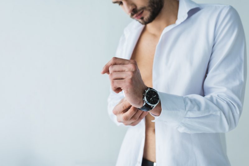 Male Model Putting on Watch