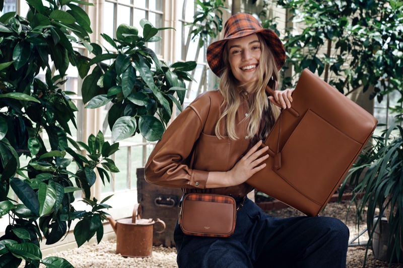 Flashing a smile, Vanessa Axente fronts Oroton fall-winter 2019 campaign