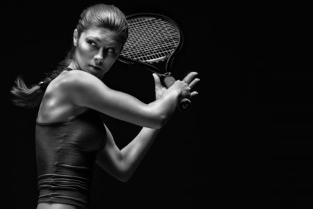 Attractive Woman with Tennis Racket