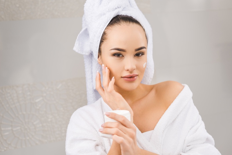 Woman Glowing Skin with Face Cream