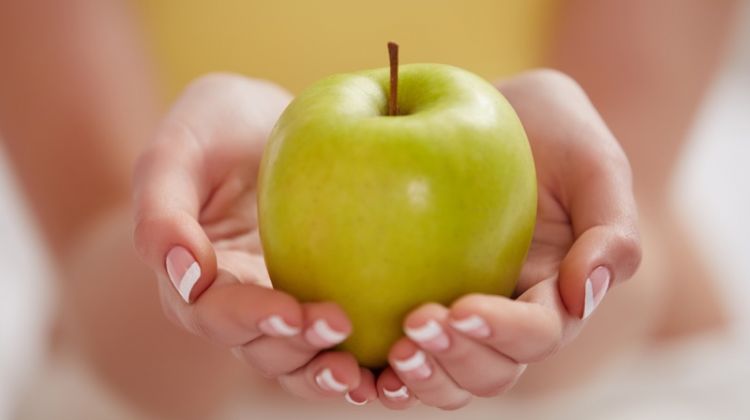 Healthy Foods Can Be Delicious Too Woman Holding Green Apple