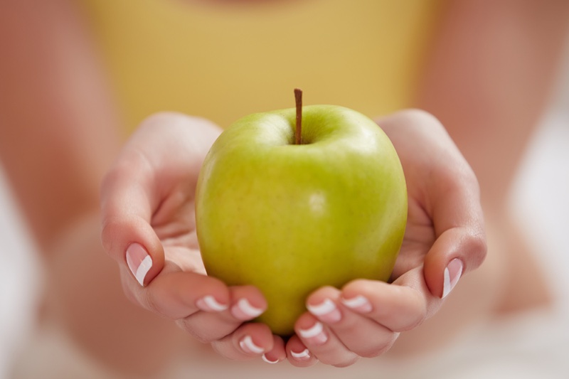 Woman Holding Green Apple