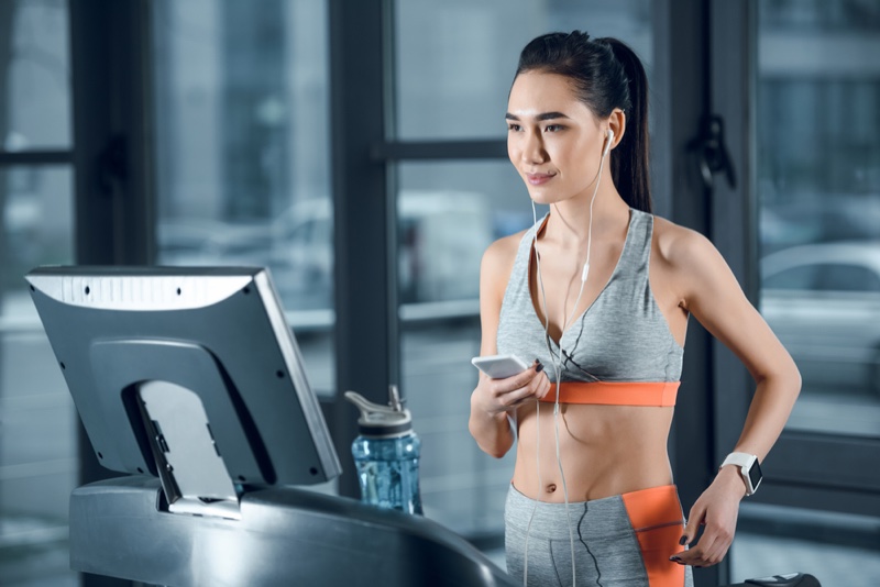 Woman Working Out on Treadmill