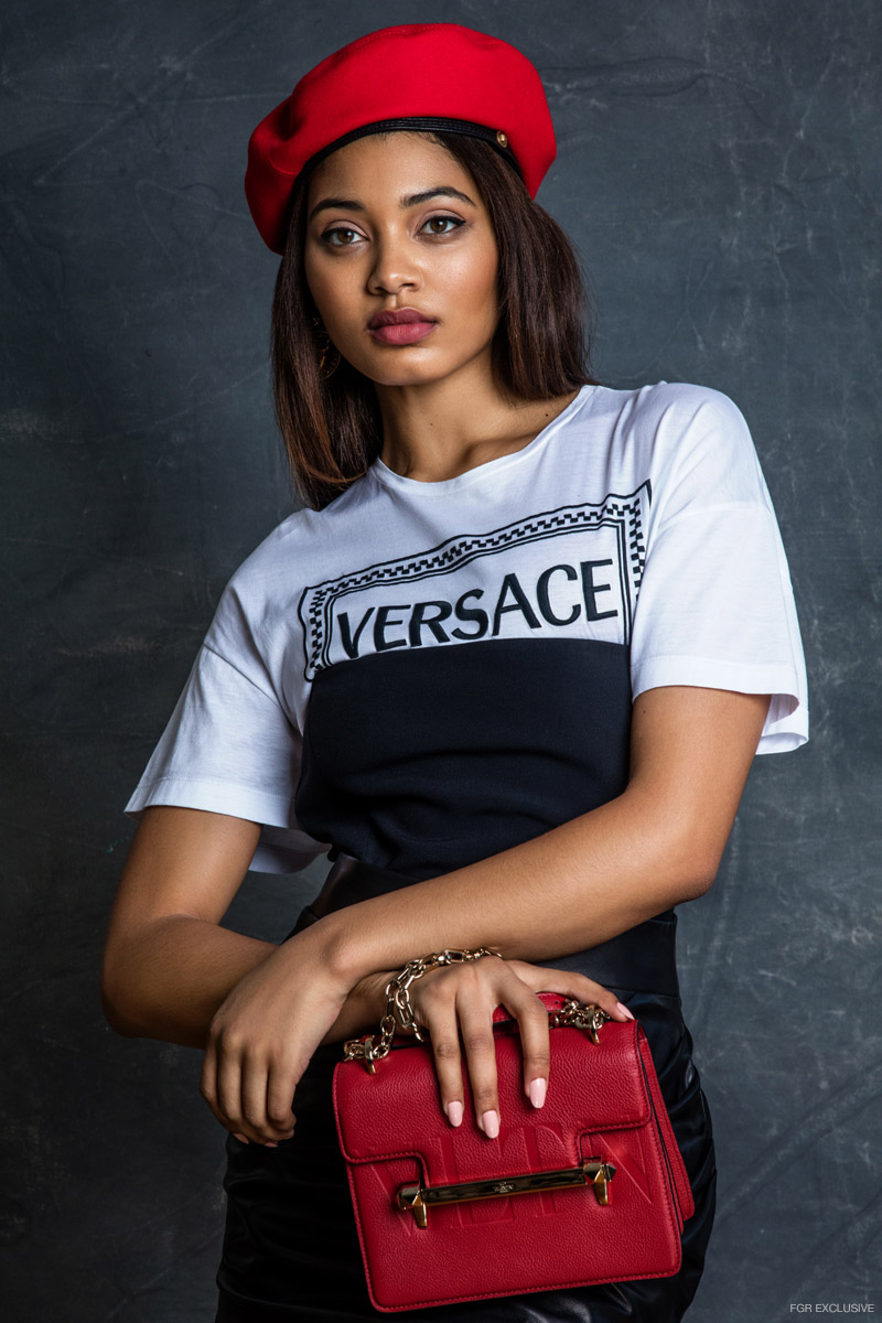 Versace Logo T-Shirt, Bodice Corset, Leather Skirt & Beret and Valentino Handbag. Photo: Eniko Szucs