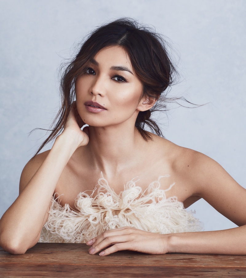 Gemma Chan wears feather embellished top from Oscar de la Renta