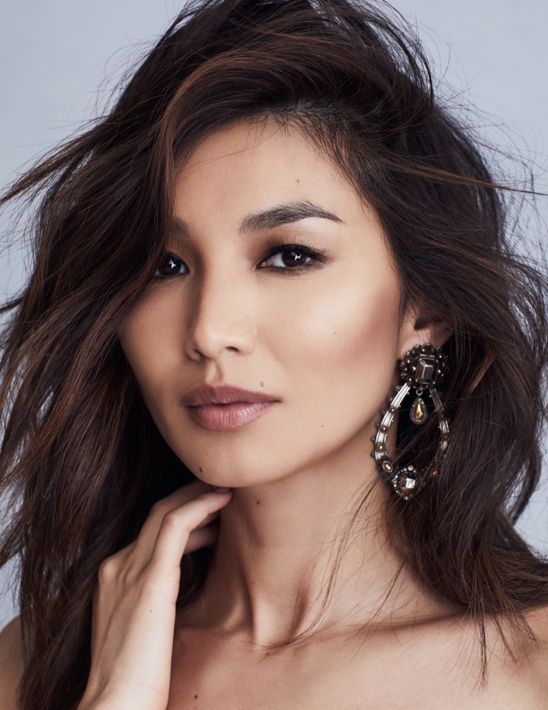 Actress Gemma Chan poses in Alexander McQueen earrings