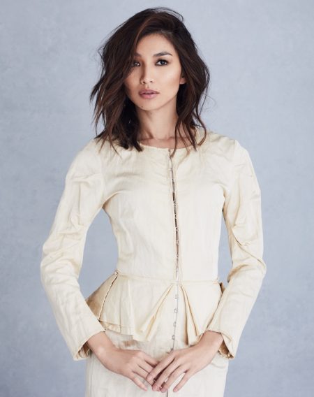 Wearing a tailored look, Gemma Chan strikes a pose