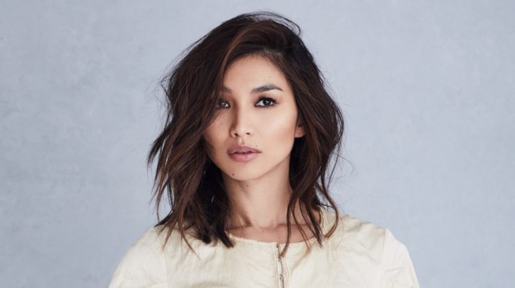 Wearing a tailored look, Gemma Chan strikes a pose