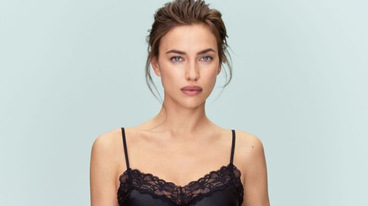 Model Irina Shayk wears lace-trimmed camisole and shorts from Intimissimi Silk collection