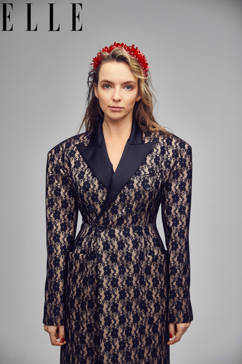 Jodie Comer wears Christopher Kane coat with Simone Rocha headband