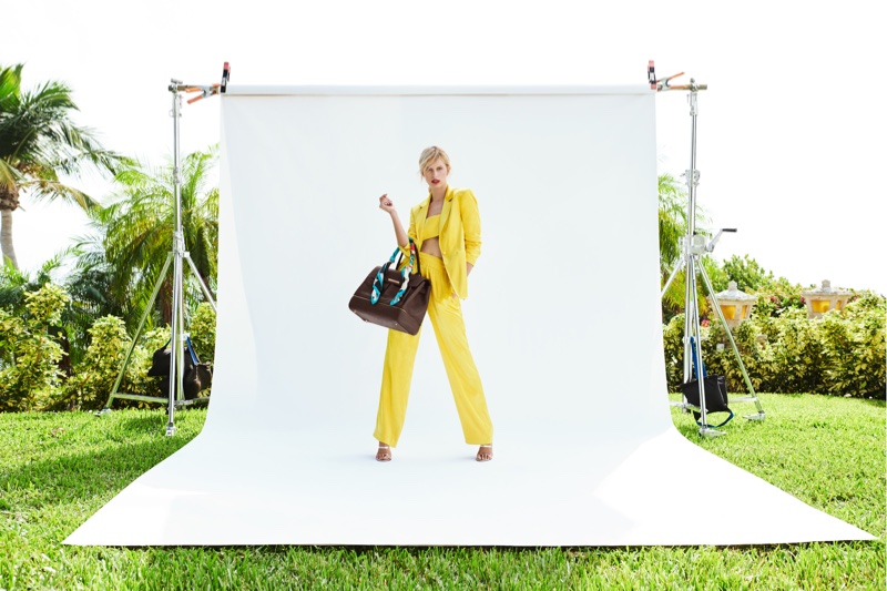 Suiting up, Karolina Kurkova poses with bag from Cybex collaboration