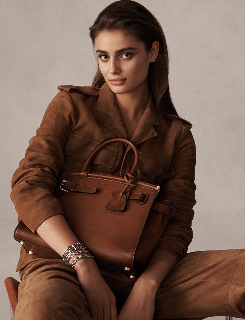 Model Taylor Hill poses with Ralph Lauren RL50 handbag in medium silhouette