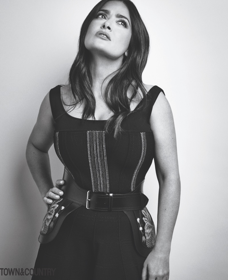 Photographed in black and white, Salma Hayek wears form-fitting look