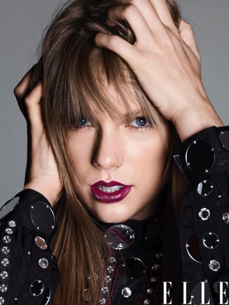 Taylor Swift Gets Her Closeup in ELLE Cover Story Taylor Swift poses in a Gucci embellished top