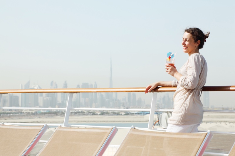 Woman on Dubai Cruise Ship with Drink