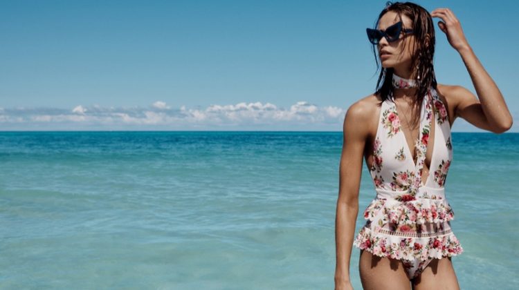 Birgit Kos wears Zimmermann Honour one piece swimsuit with ruffles