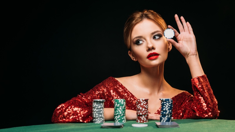 Beautiful Woman Red Sequin Dress at Casino Table