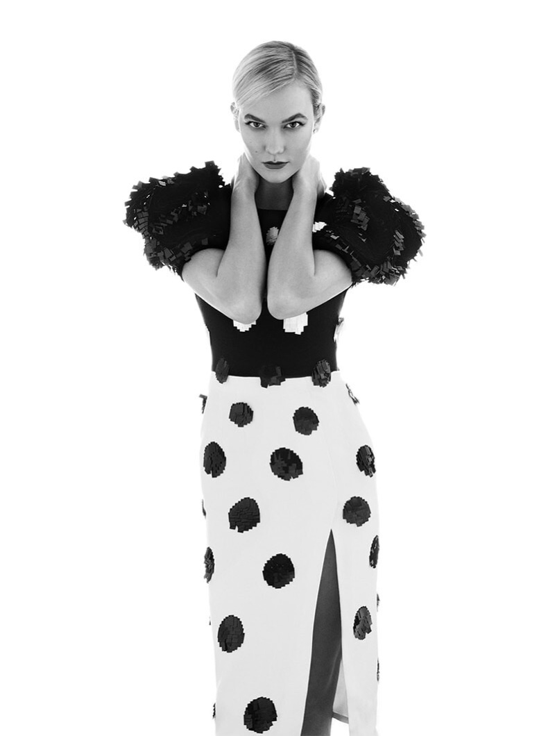 Captured in black and white, Karlie Kloss wears a Carolina Herrera design