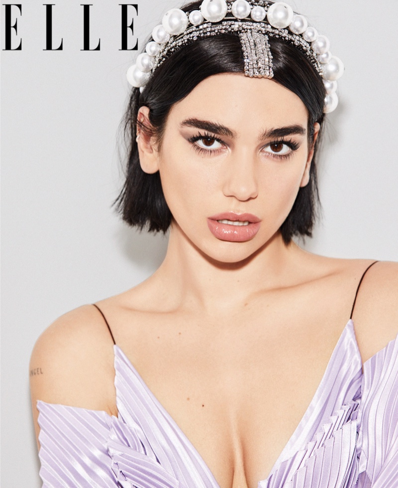 Dua Lipa wears Givenchy Haute Couture top and headband