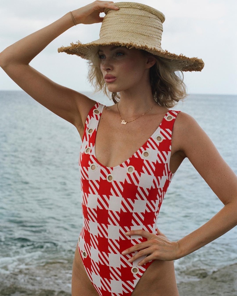 Model Elsa Hosk poses in gingham print swimsuit from Solid & Striped