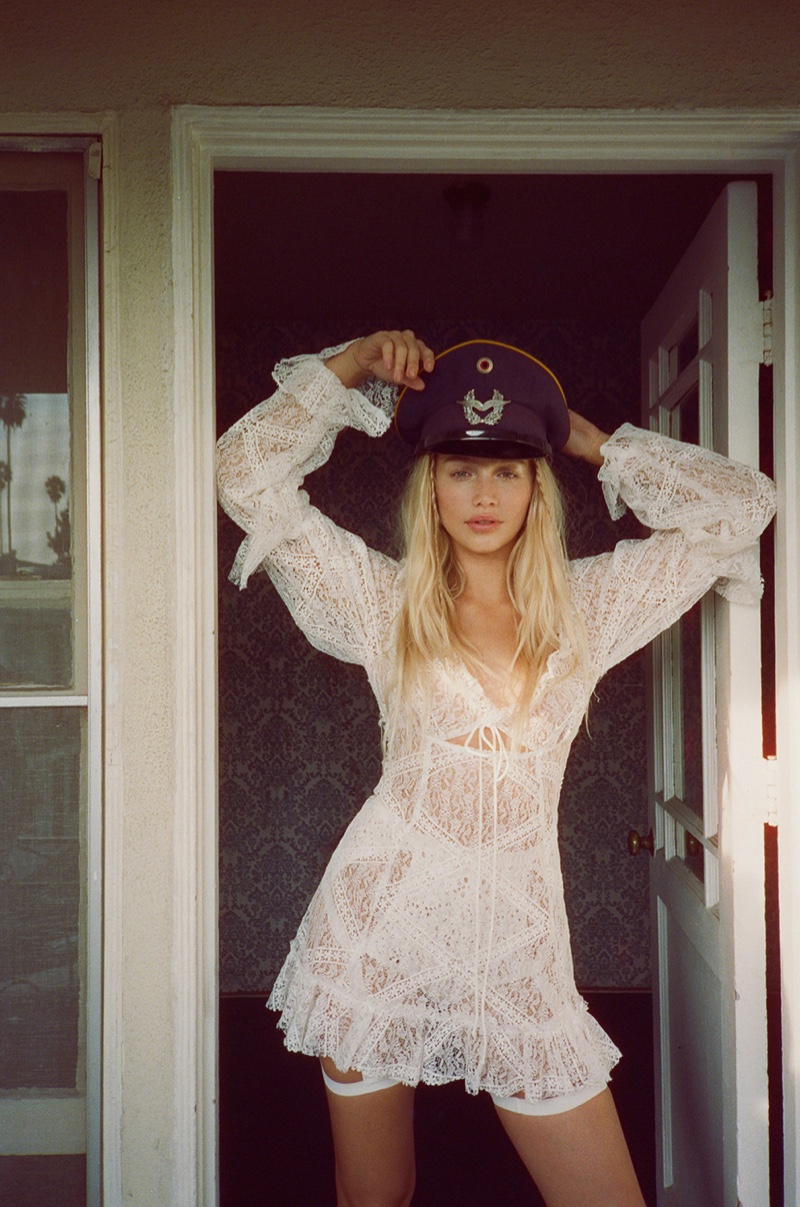 Cailin Russo poses in For Love & Lemons Sequoia lace mini dress