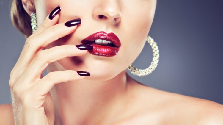 Model Wears Diamond Hoop Earrings with Red Lipstick