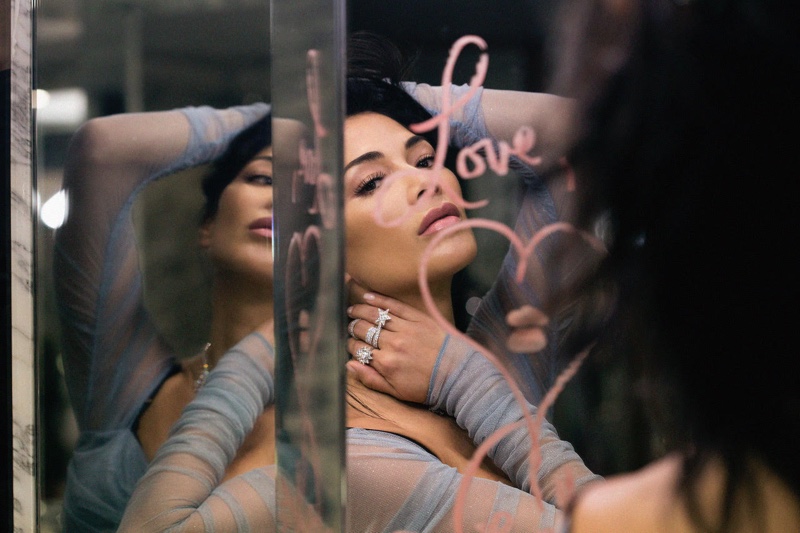 Nicole Scherzinger looks into a mirror